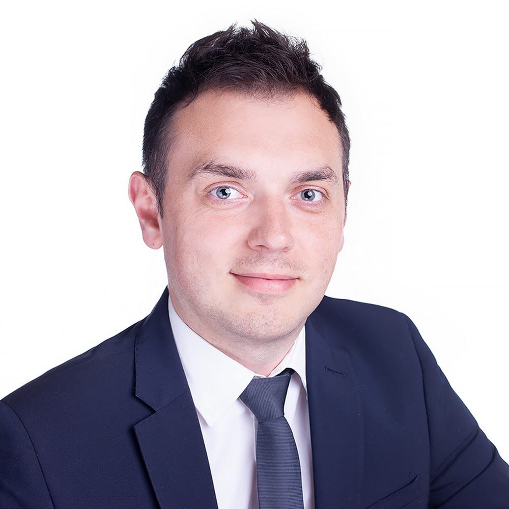 Radosław Kienigsman - Biuro Nieruchomości Warszawa Żoliborz
